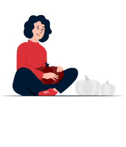 Sitzende Person mit einem Kürbis.
