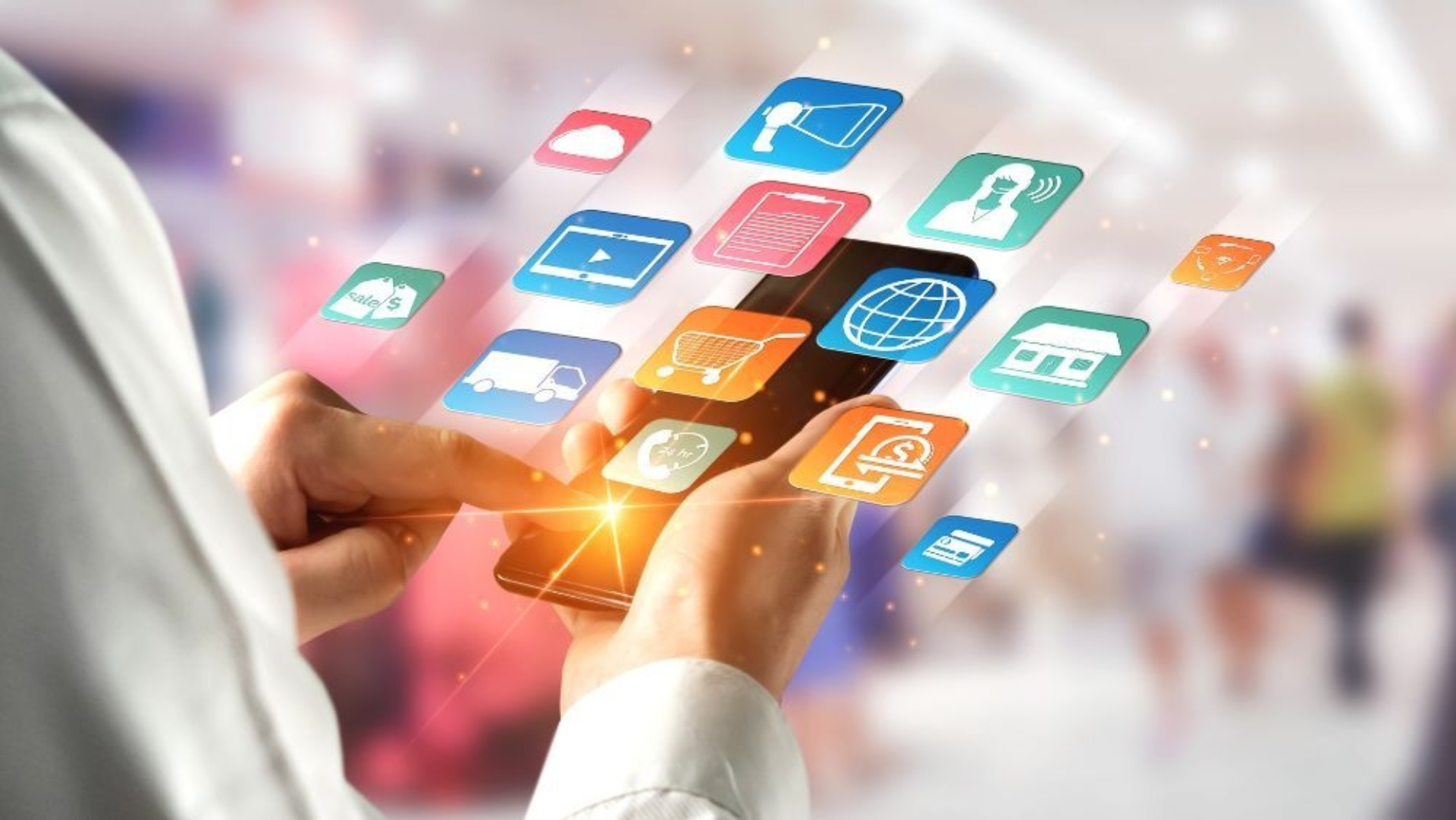 Ein Handy über dem viele verschiedene Apps schweben.